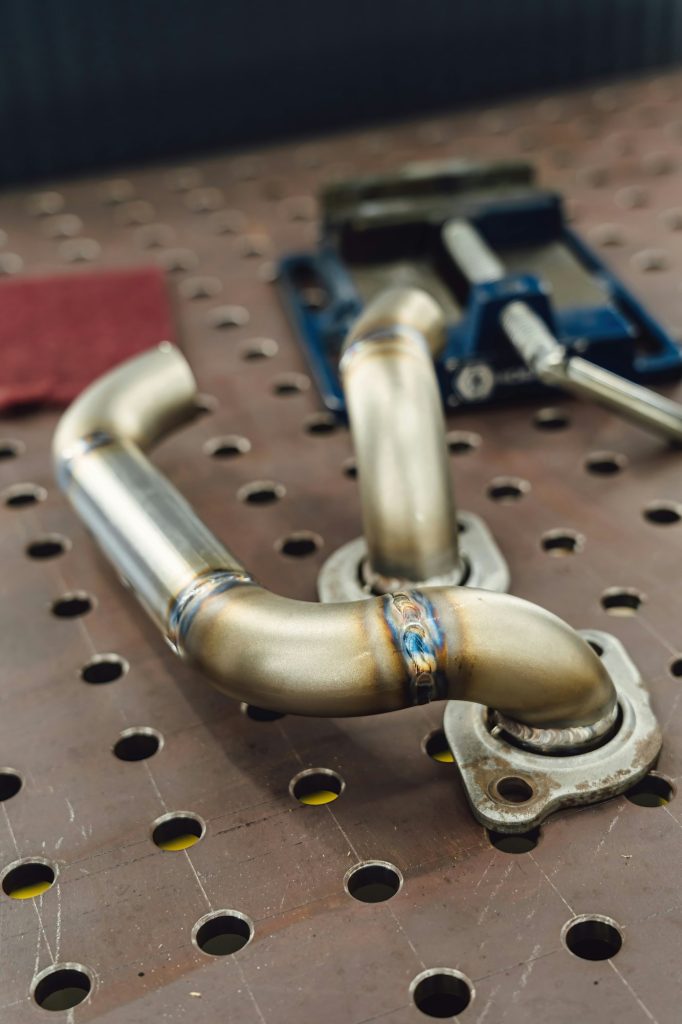 Welded production of external wastegate manifold from stainless steel, exhaust manifolds in a